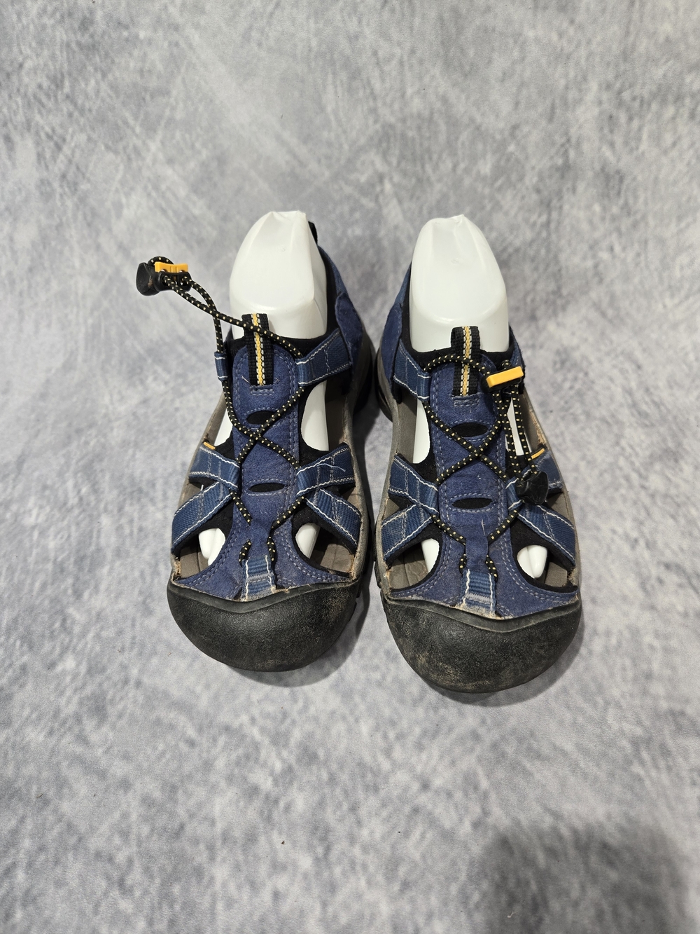 KEEN Newport H2 sandals feature a protective black rubber toe bumper and a bunge